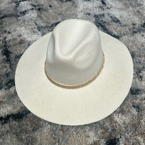Beige/Cream Kittenish Hat with chain accent, it has a couple stains see pics